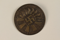 1996.75.56 front
Nazi Party election badge

Click to enlarge