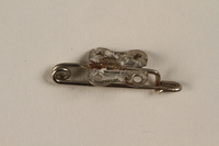 1996.75.7 front
Safety pin from a Nazi badge

Click to enlarge