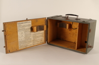 1996.77.1.2_a open
Filmstrip projector case

Click to enlarge