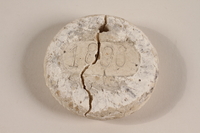 1997.23.1 front
Crematorium tag found by a US soldier in Dachau concentration camp after liberation

Click to enlarge