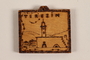 Small wooden tile with the Terezin church steeple made by a former Jewish Czech concentration camp inmate