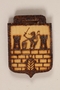 Small wooden shield with a Terezin crest made by a former Jewish Czech concentration camp inmate