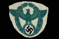 1998.58.4 front
Badge bearing design of Nazi German national emblem

Click to enlarge