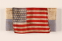 Blue and white striped armband with a US flag patch