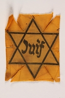 1999.171.1 front
Star of David badge with Juif printed in the center

Click to enlarge