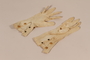 Pair of 2 button gloves worn by multiple Jewish brides in a DP camp