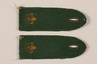 2000.24.15_a-b front
Boy Scout shoulder board with RP and fleur de lis

Click to enlarge