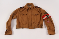 2013.512.2 front
Hitler Youth jacket with insignia and armband found by a US soldier

Click to enlarge