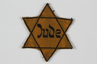 1990.11.1 front
Star of David badge printed with Jude

Click to enlarge
