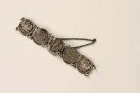 1990.121.1 front
Silver coin bracelet worn by a German Sinti woman

Click to enlarge