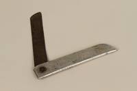 1990.220.2 front
Pocket knife used by a Polish Jewish female slave laborer

Click to enlarge