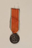1990.252.4 front
Medal and ribbon commemorating the 1938 Anschluss of Austria

Click to enlarge
