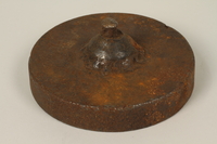 1990.285.11 front
Metal scale weight of the type used in Łódź Ghetto

Click to enlarge