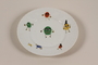 Plate with colorful, oval-shaped cartoon figures carried by a Kindertransport refugee