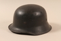 Helmet taken from a captured German by a US soldier