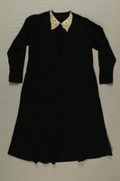 2008.227.4 front
Long sleeved black dress saved by a neighbor and recovered postwar

Click to enlarge