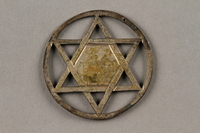 2006.363.7 front
Round Star of David pendant made by a Jewish prisoner in Theresienstadt ghetto-labor camp

Click to enlarge