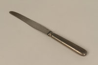 1988.154.1 front
Table knife with a swastika given to a Polish Jewish girl during forced labor farm service

Click to enlarge
