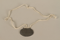 2008.319.1 back
Identification tag with name and birthdate issued to a Jewish refugee child

Click to enlarge