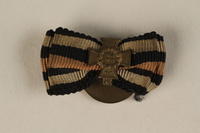 1988.156.1.4 front
Honor Cross of the World War 1914/1918 non-combatant veteran service buttonhole ribbon bar awarded to a German Jewish soldier

Click to enlarge