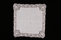 2009.117.6 front
Embroidered white handkerchief with floral lace border brought with a Polish Jewish emigre

Click to enlarge