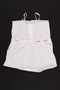 Child's white romper with embroidered flowers brought with a Polish Jewish emigre