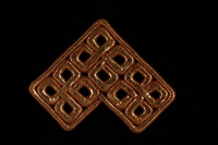 2009.117.21 front
Metallic bronze tallit decoration of entwined squares brought with a Polish Jewish emigre

Click to enlarge