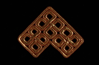 2009.117.23 front
Metallic bronze tallit decoration of entwined squares brought with a Polish Jewish emigre

Click to enlarge