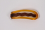 Yellow and brown plastic hair clip owned by a young girl in German occupied Budapest