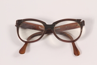 2009.204.7 front
Brown plastic eyeglasses worn by a Jewish resident of the Lvov ghetto

Click to enlarge