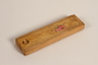 Wooden sliding lid pencil box with a rose decal used by a student in Nazi Germany