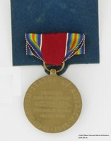 2009.364.3a back, World War II Victory Medal, Tom T. Kovary
