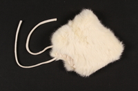 2009.372.3 front
Child's white rabbit fur bonnet received in a displaced persons camp

Click to enlarge