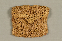 1990.57.1 front
Straw purse with crocheted  trim acquired in Gurs internment camp by a German Jewish prisoner

Click to enlarge