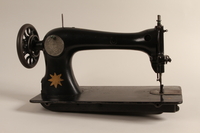 1990.78.4 front
Treadle sewing machine with painted star of the type used in Łódź Ghetto

Click to enlarge