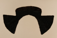 2009.376.9 front
Black fetal horse fur coat collar with black satin lining brought to the US by a Jewish family fleeing German occupied Poland

Click to enlarge