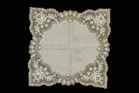 2009.376.36 front
White silk handkerchief with handmade floral lace design brought to the US by a Jewish family fleeing German occupied Poland

Click to enlarge