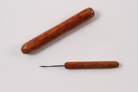 2008.228.10 open
Darning needle and case used in the Warsaw ghetto

Click to enlarge