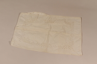 2010.442.11 front
White pillowcase embroidered with a floral design recovered by a Hungarian Jewish woman from her neighbors

Click to enlarge