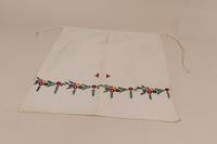 2010.442.14 front
Apron with a garland of multicolored floral embroidery recovered by a Hungarian Jewish woman from her neighbors

Click to enlarge