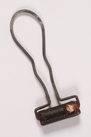 2010.441.8 front
Rubber ink roller with a wire handle used by a Dutch resistance member to forge identity cards

Click to enlarge