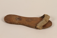 2010.464.2_b front
Wooden sandals with a canvas strap worn by a Mir Yeshiva refugee in Shanghai

Click to enlarge