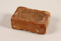 1991.123.2 front
Soap acquired by a prisoner in Buna concentration camp

Click to enlarge