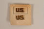 Copper colored U.S. lapel pin owned by a German Jewish US soldier