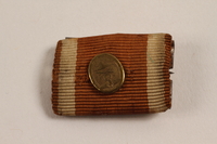 2003.149.76 front
Ribbon bar award for construction of the German West Wall acquired by German Jewish US soldier

Click to enlarge