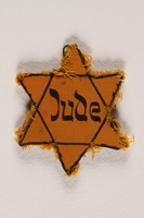 1988.64.1.4 front
Star of David badge with Jude printed in the center

Click to enlarge