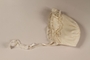 White lace baby bonnet used postwar by a former hidden child