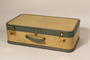 Yellow and green suitcase with key used by a German Jewish girl