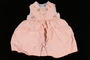 Light pink sleeveless dress worn by a hidden Dutch Jewish infant