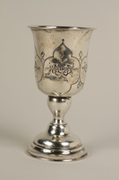 2002.250.3 front
Silver, engraved kiddush cup used by German Jewish refugees in Shanghai

Click to enlarge